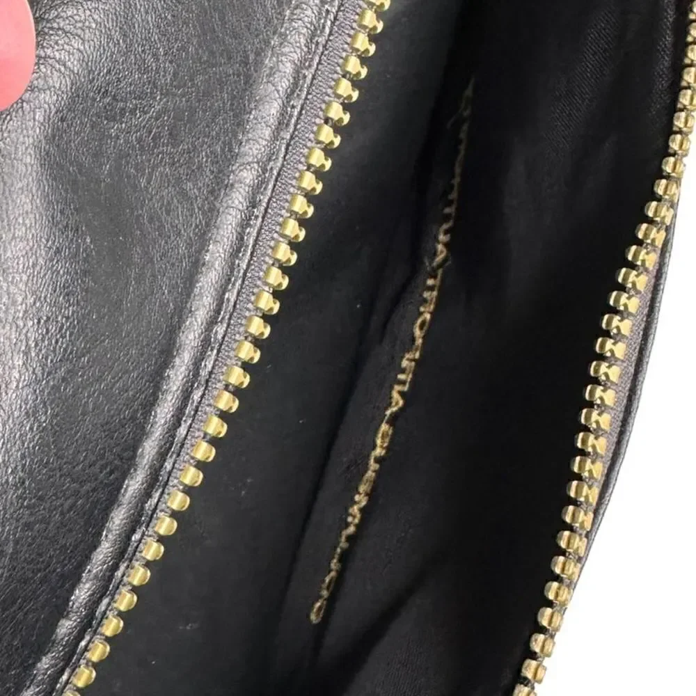 Large leather travel/work bag black with lots of pockets adjustable shoulder str